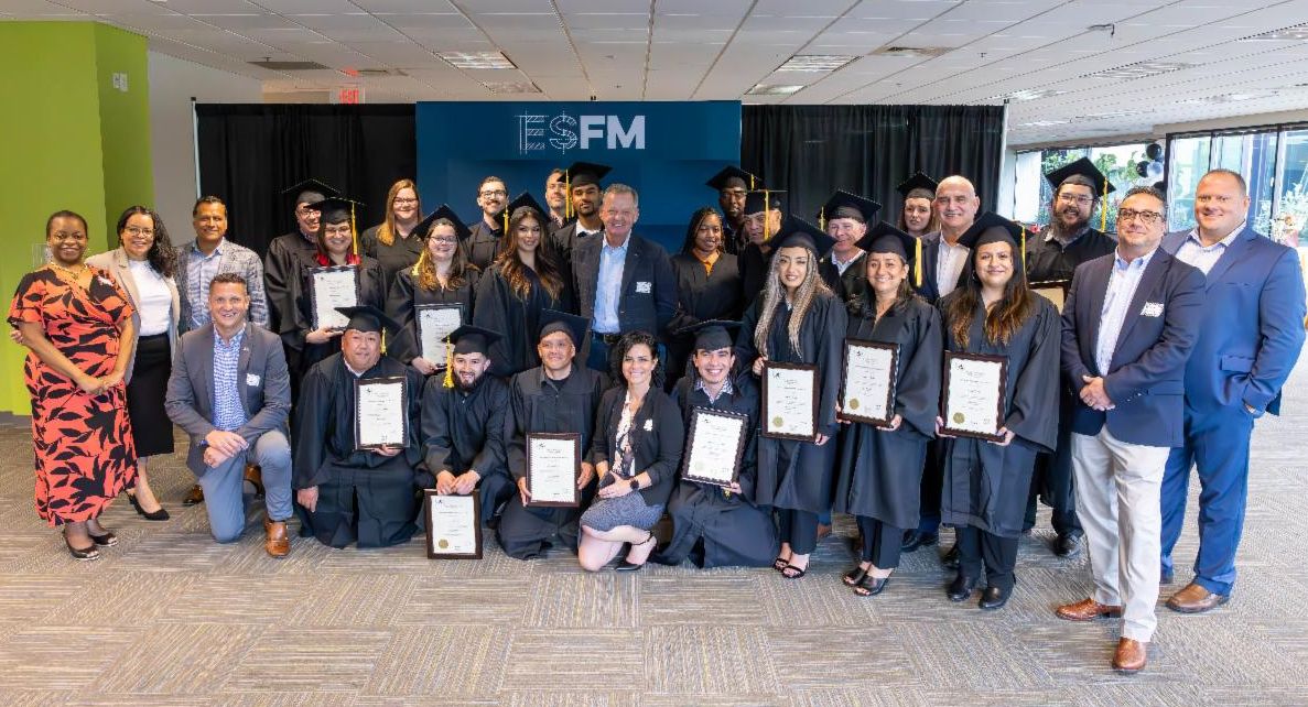 ESFM leaders pose with associates graduating from the GULL program.
